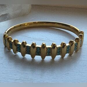 Gold Tone & Blue Rhinestone Bangle. 7” opens on side